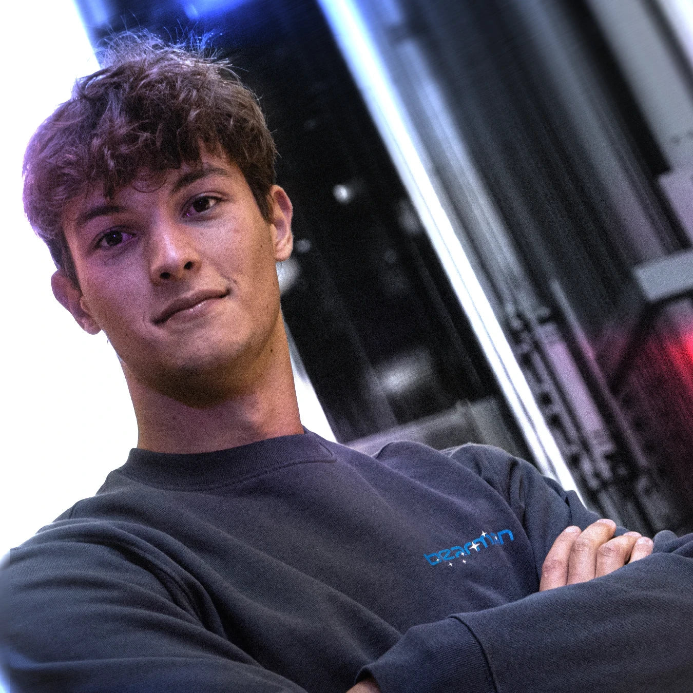 Ollie wearing the Project/Ursa sweatshirt